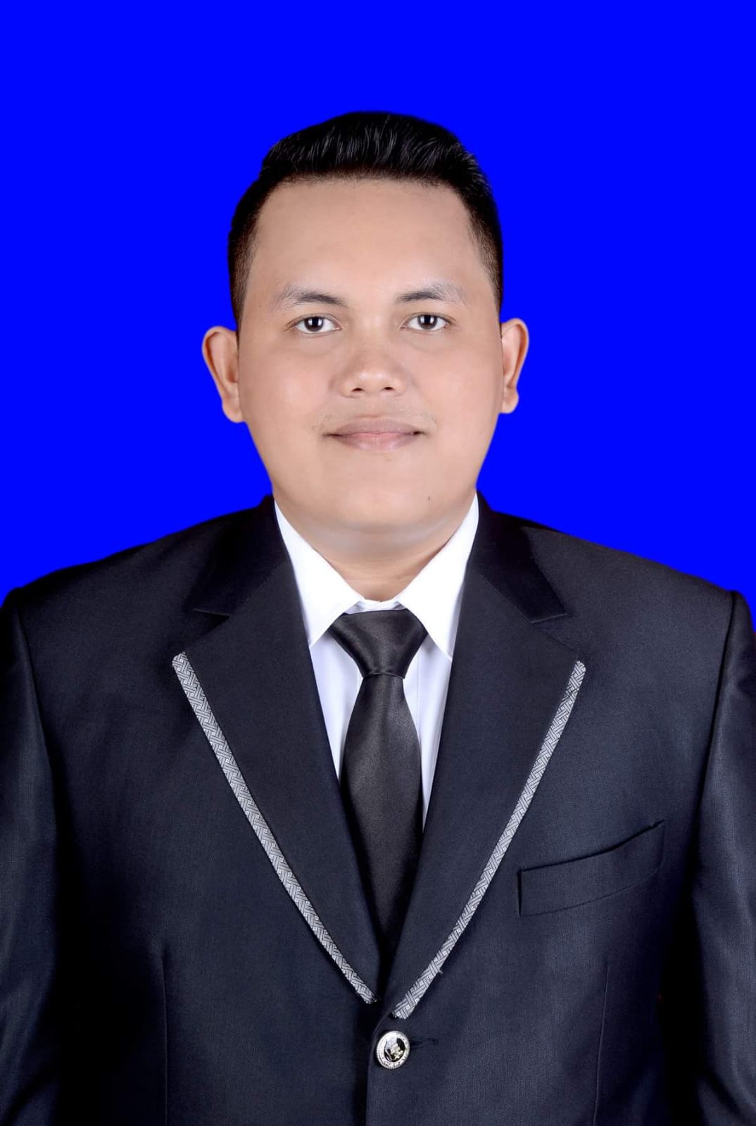Rolan Parasihan, S.H.